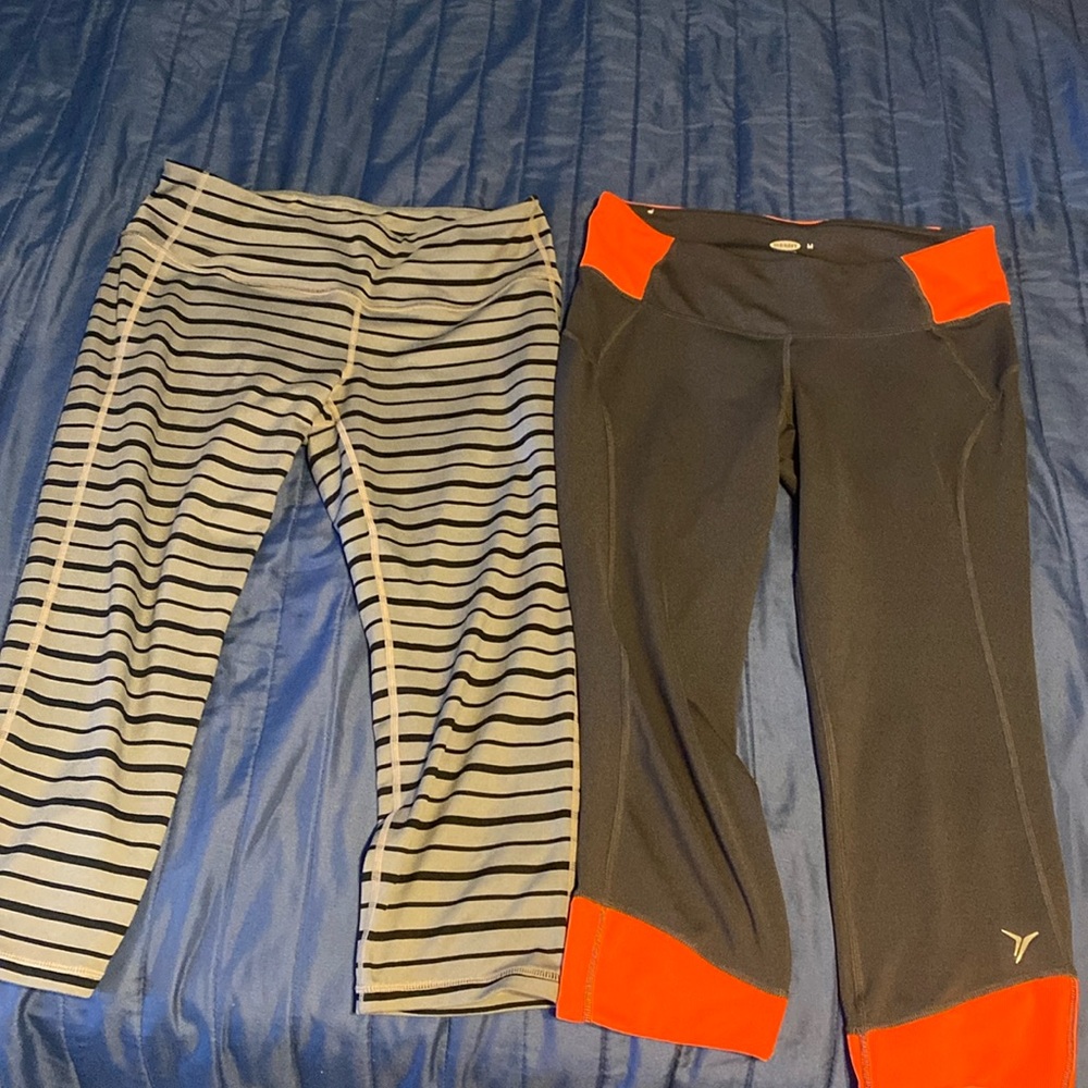 2 capri leggings size M. Orange & black are Old Navy, gray & black are Athleta.